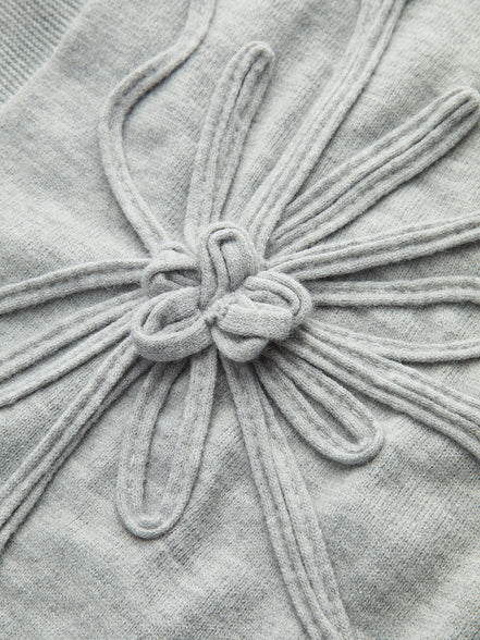 Livia - jersey de manga corta con aplique floral