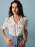 Camisa Floral de Encaje Plisada